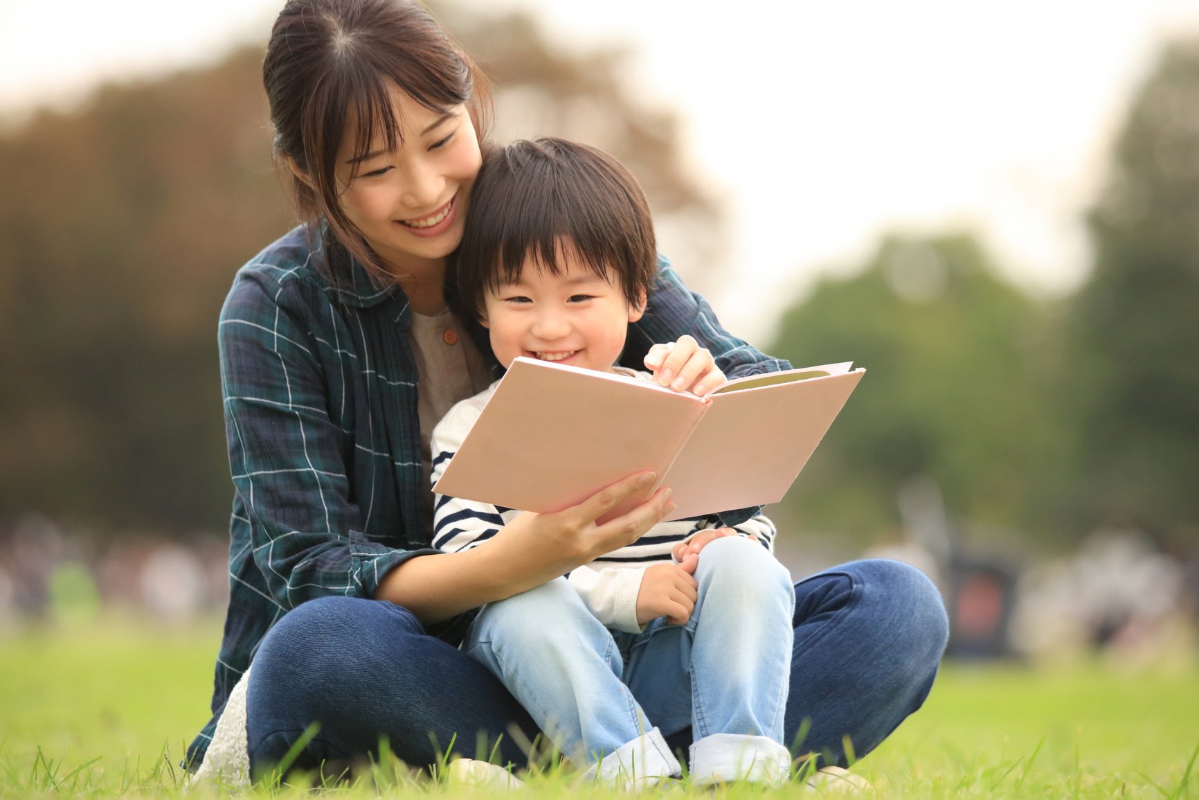 Parents and children reading books